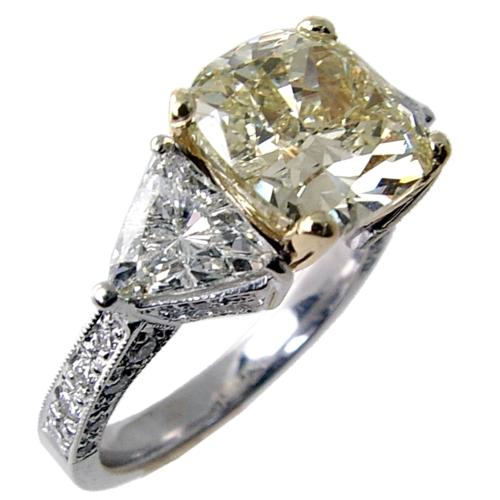 Three Stone (Trillions on the side) diamond engagement ring