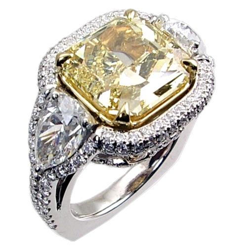 Pave Set Two Tone Engagement Ring with 2 Pears on the side