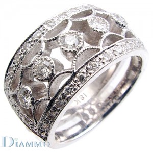 Pave Set Anniversary Ring with Bezel Set Round in the middle